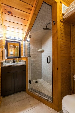 Bathtub, hair dryer, bidet, towels