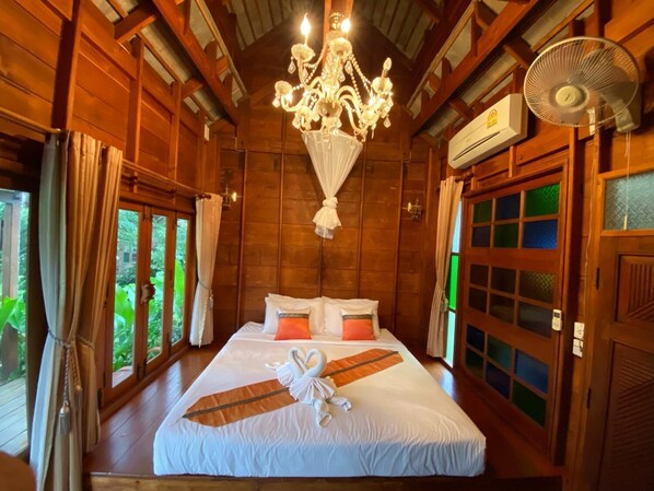 Individually decorated, individually furnished, desk, rollaway beds