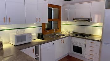 Fridge, microwave, coffee/tea maker, electric kettle