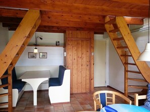 Apartamento família, 2 quartos | Área de estar