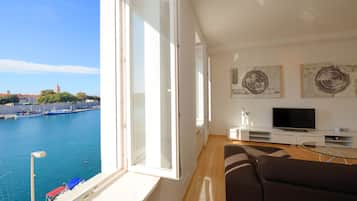 Luxury Apartment, 2 Bedrooms, Sea View | Living area | 139-cm flat-screen TV with satellite channels, Smart TV
