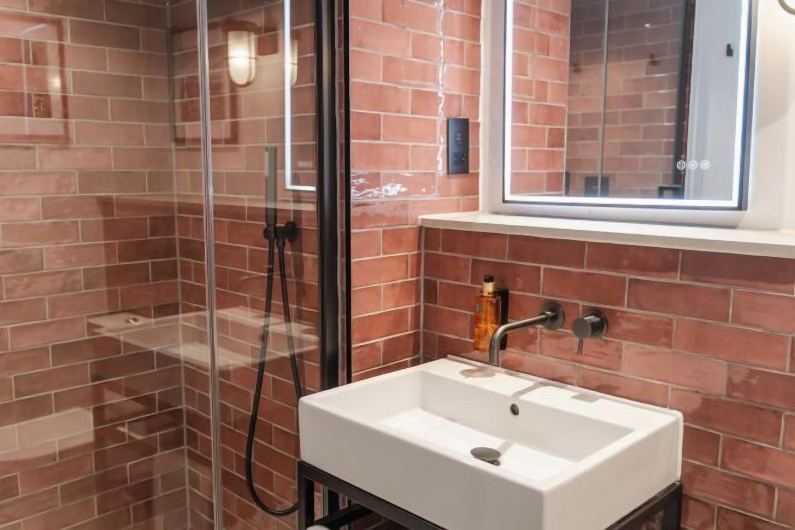 Bathroom | Shower, free toiletries, hair dryer, towels