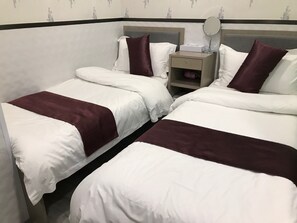 Tomannsrom, 2 enkeltsenger | Dundyner, lydisolert, wi-fi (inkludert) og sengetøy