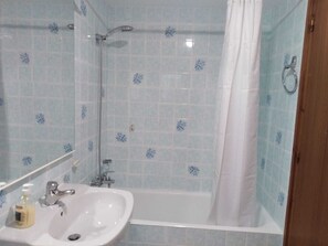Hair dryer, towels, soap, shampoo