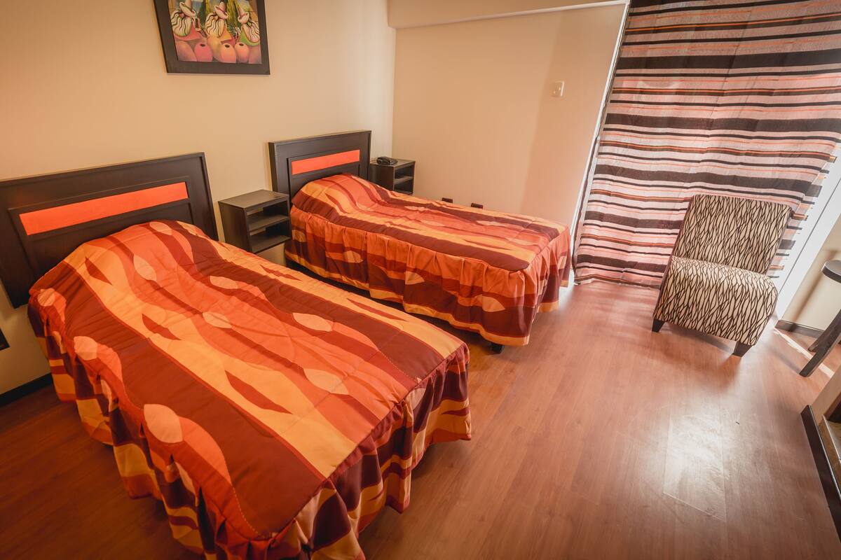 Blackout drapes, WiFi (free), bed sheets