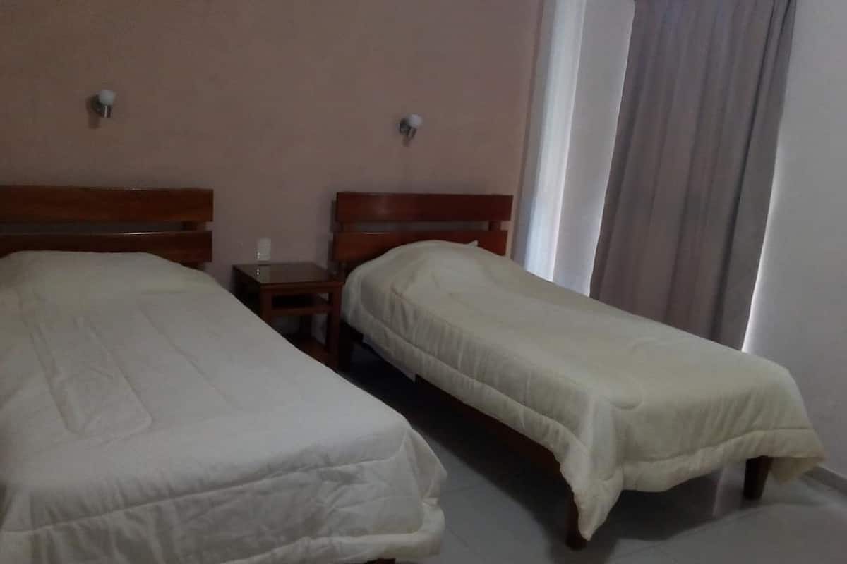 Basic Room, Multiple Beds | Blackout drapes, iron/ironing board, WiFi (free), bed sheets