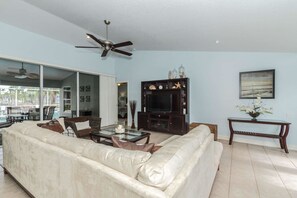 House, Multiple Beds (SW Cape Coral Vacation Home) | Living area | TV, DVD player - SW Cape Coral Vacation Home (Cape Coral)