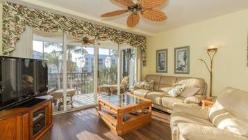 House, Multiple Beds (Hibiscus Pointe 124) | Living area | TV, DVD player