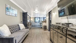 House, Multiple Beds (Beach Tree Hippie House) | Living area | TV - Beach Tree Hippie House (Fort Myers Beach)
