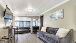 House, Multiple Beds (Beach Tree Hippie House) | Living area | TV - Beach Tree Hippie House (Fort Myers Beach)