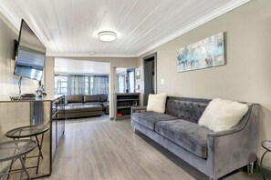 House, Multiple Beds (Beach Tree Hippie House) | Living area | TV - Beach Tree Hippie House (Fort Myers Beach)