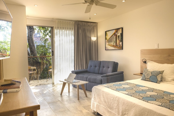 Junior Room, 1 Queen Bed | In-room safe, iron/ironing board, free WiFi, bed sheets