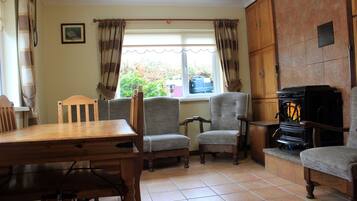 Family Cottage, 4 Bedrooms | Living area | Flat-screen TV