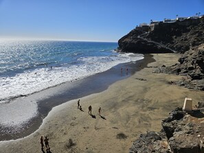 On the beach, black sand - Acapulco (San Bartolomé de Tirajana)