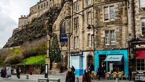 A historic stone building with a castle-like facade, a café named 'Cafe Jacques', and a sign for 'Cold Town Hotel'. - Grassmarket, Below Edinburgh Castle in Old Town (Edinburgh)