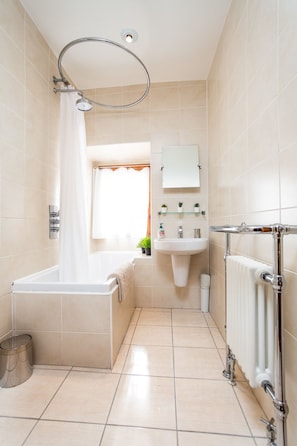 Apartment | Bathroom | Combined shower/tub, deep soaking tub, hair dryer, towels