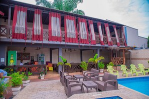 Outdoor pool, pool umbrellas, pool loungers