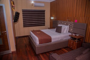 Premium bedding, down comforters, desk, laptop workspace