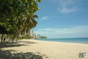 On the beach, white sand