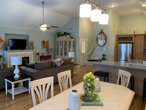 Enjoy a meal in the dining area, relax on the sofa, or cook with modern appliances in this well-appointed space.