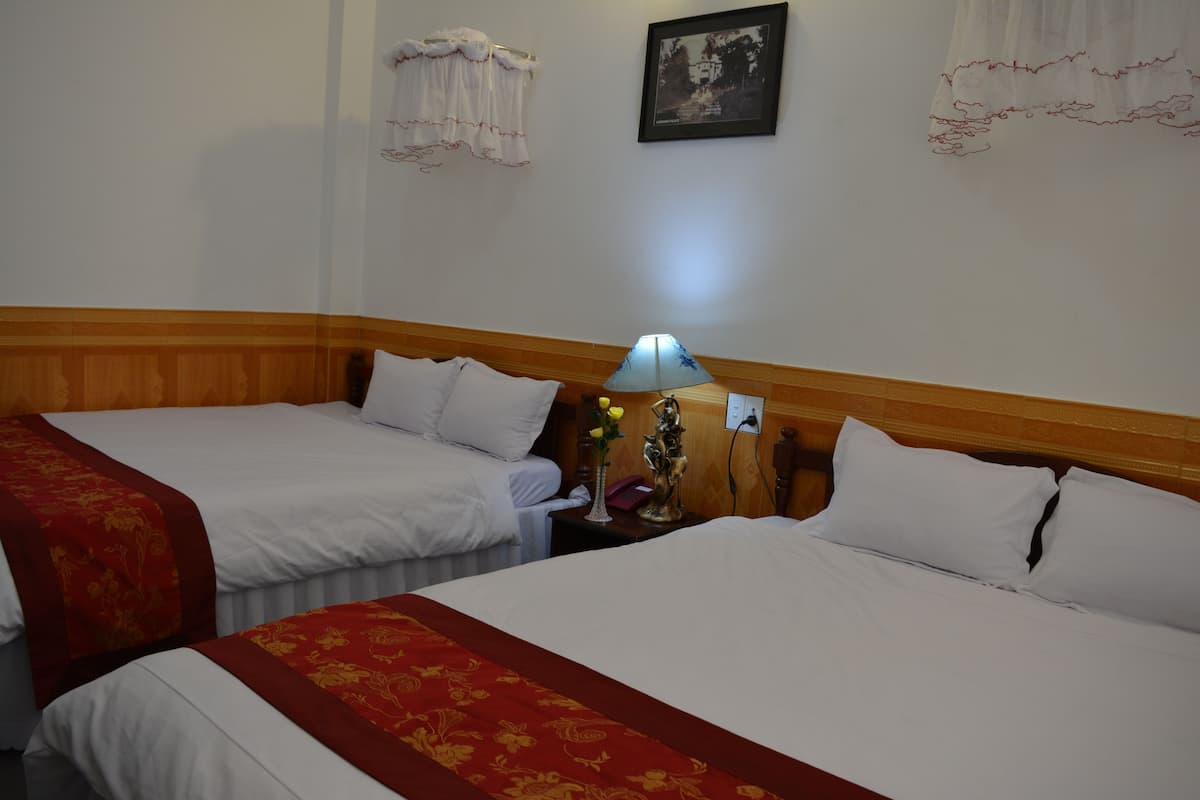 Standard Quadruple Room | Minibar, soundproofing, WiFi (free), bed sheets