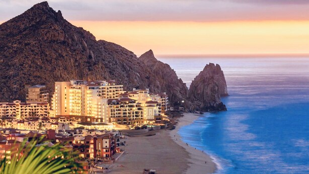 A coastal hotel with multiple buildings, a beach, and rocky cliffs. - Stunning 2br/2 KING Beds / Spectacular View & Best Location - Expansive Balcony  (Cabo San Lucas)