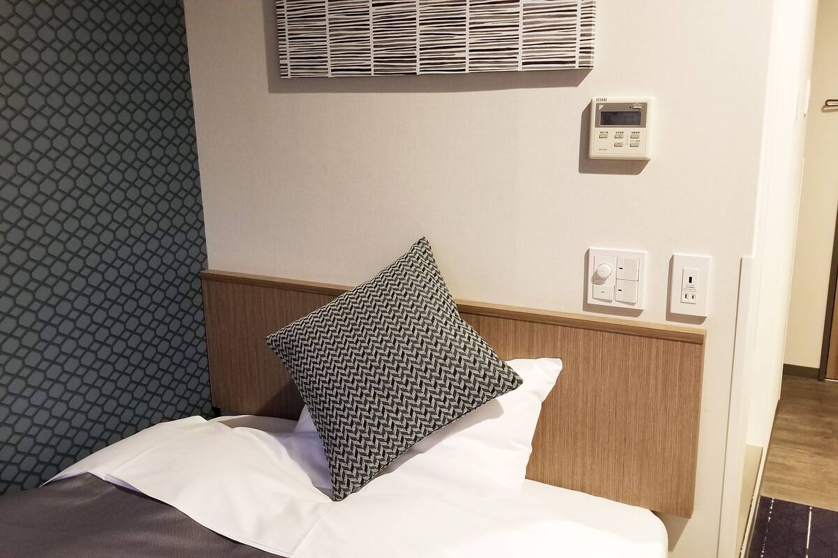 Desk, blackout curtains, free WiFi, bed sheets