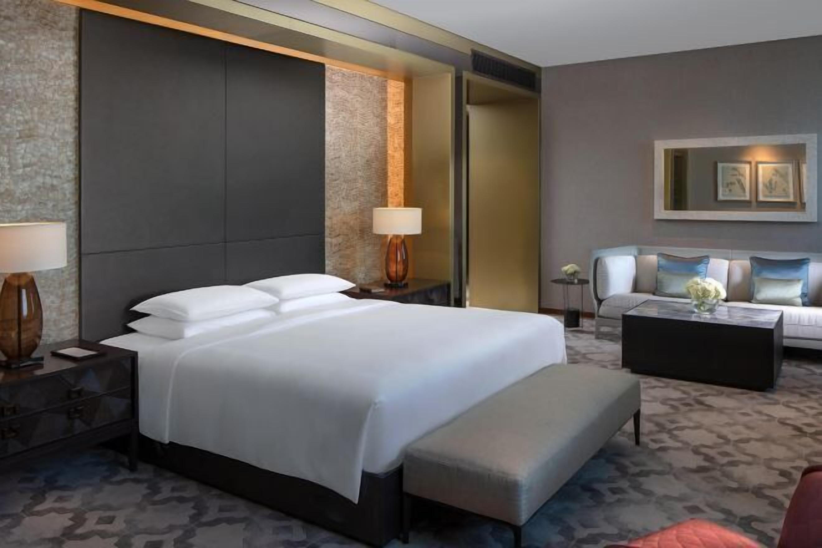 Premium bedding, down comforters, minibar, in-room safe