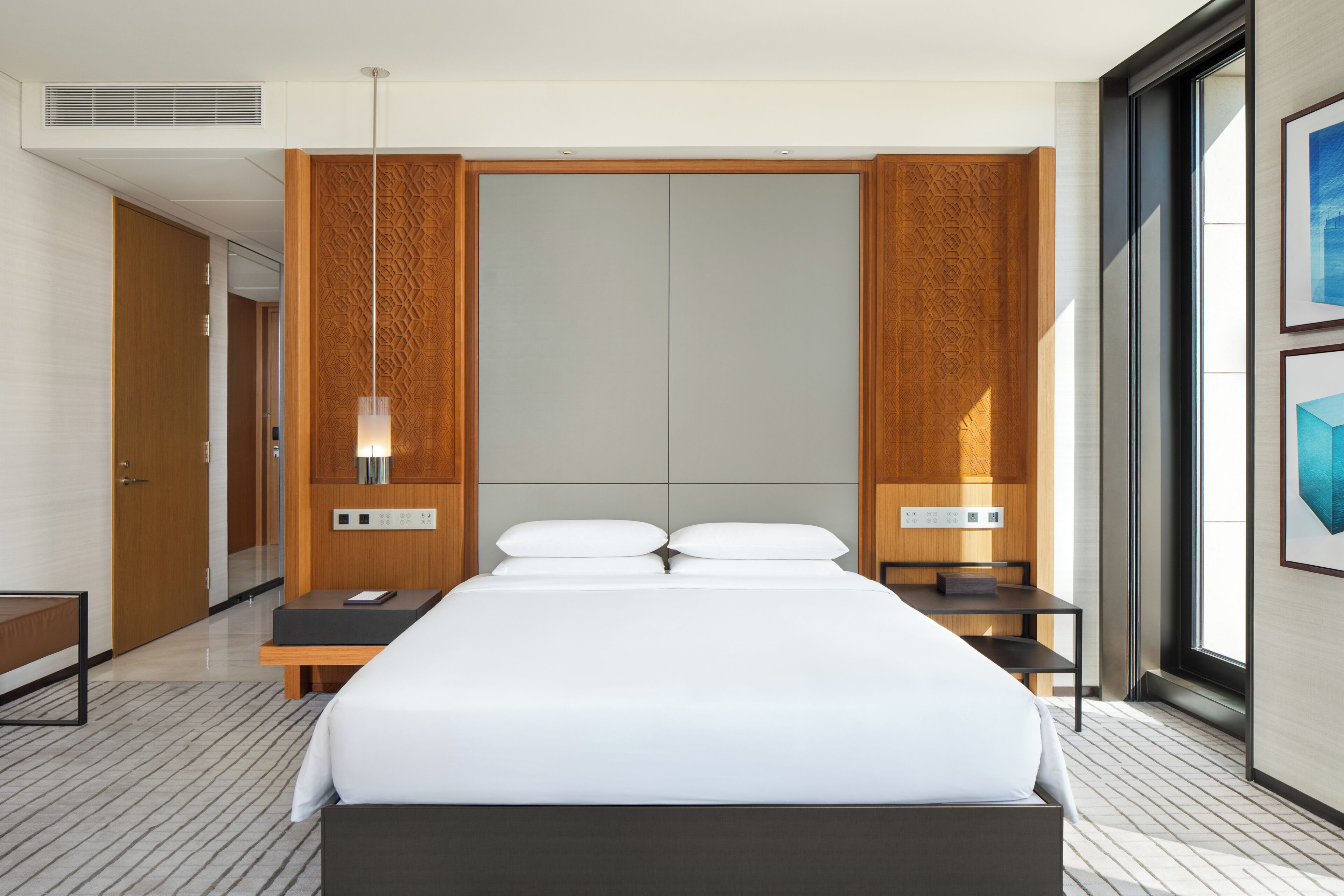 Premium bedding, down comforters, minibar, in-room safe