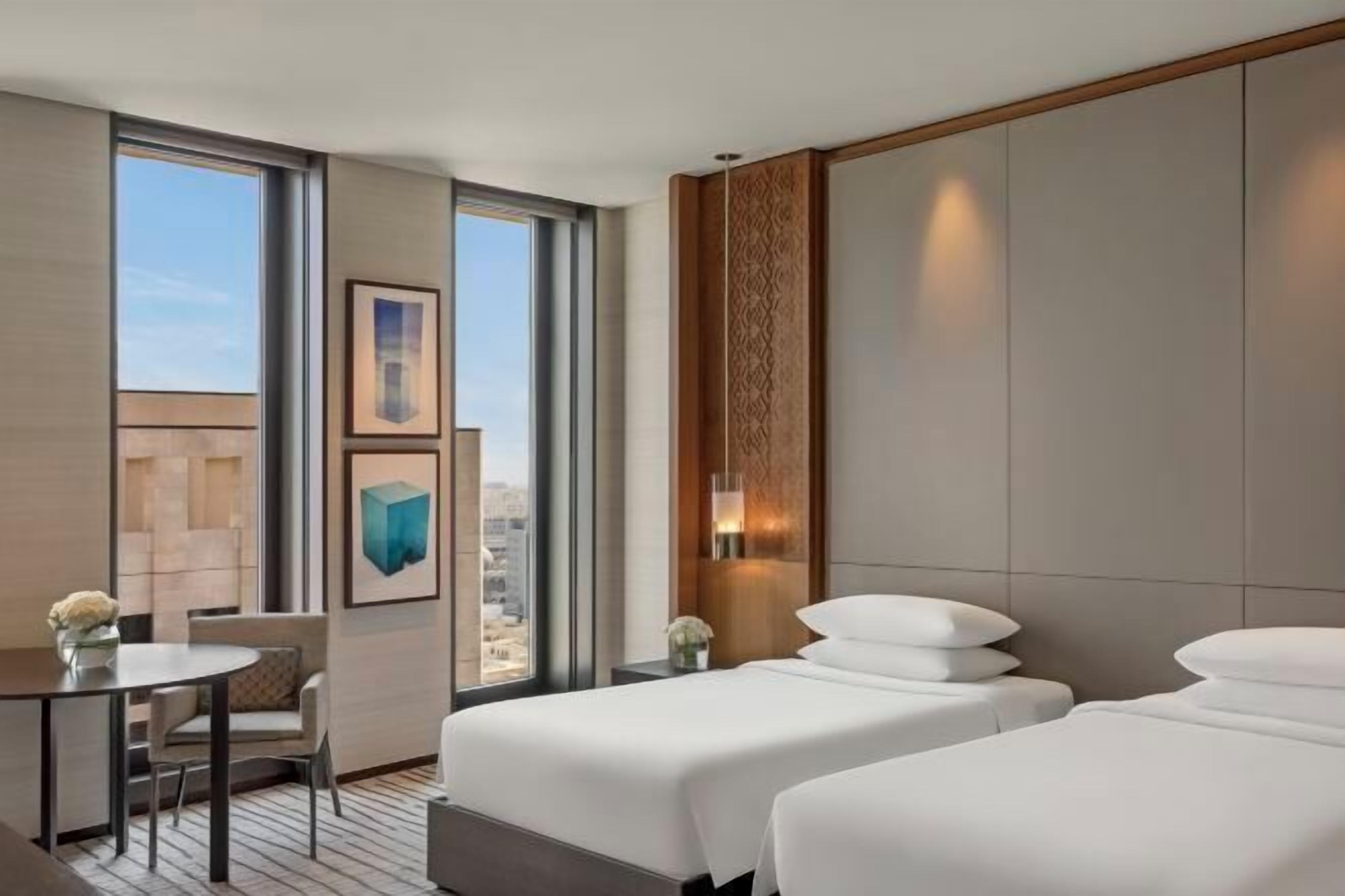 Premium bedding, down comforters, minibar, in-room safe