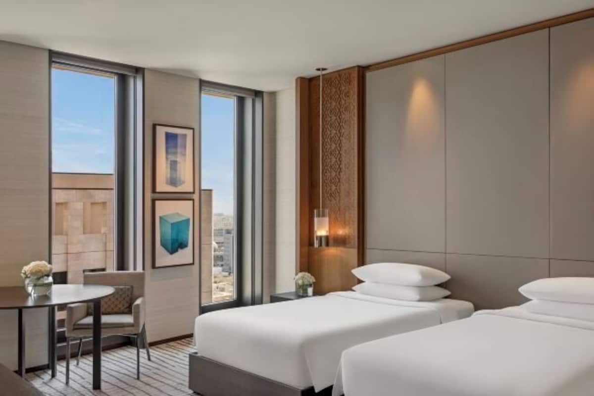 Premium bedding, down comforters, minibar, in-room safe