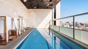 Outdoor pool, open 8:00 AM to 8:00 PM, free pool cabanas, pool loungers