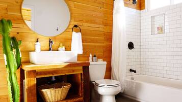 Combined shower/tub, hair dryer, towels, soap