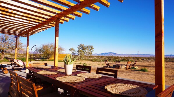 Outdoor dining - The Sunset Road House (Hot Tub! Hammocks! Fireplace!) (Landers)