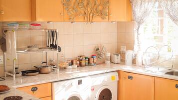 Microwave, coffee/tea maker, cookware/dishes/utensils