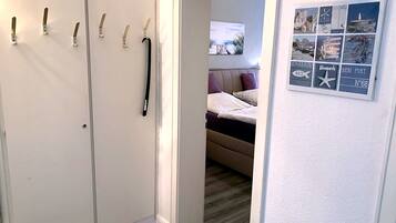 1 bedroom, travel crib, bed sheets