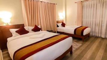 Blackout drapes, soundproofing, free WiFi, bed sheets