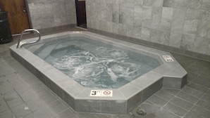A rectangular hot tub with a metal frame and a sign indicating a depth of 3 feet and a no diving warning. - 224-A Studio/Main St/Town Lift/Pool/Hot Tub/Parking  (Park City)