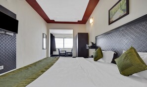 Economy Double Room, 1 King Bed | Soundproofing, rollaway beds, free WiFi, bed sheets - Treebo Mayur, Mall Road (Dehradun)