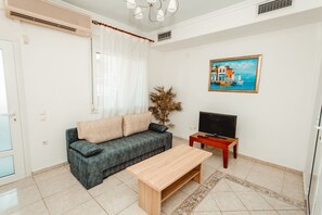 家庭公寓, 花园景观 | 起居区 | 平板电视