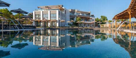 Outdoor pool, pool umbrellas, sun loungers