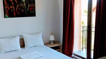 Double Room, Balcony | Minibar, individually decorated, blackout drapes, iron/ironing board
