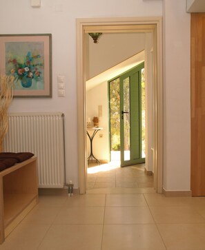 Panoramic Studio, 1 Bedroom, Ocean View, Mountainside (East) | Living area | 32-inch flat-screen TV with digital channels, LCD TV - The Garden of Zephyrus (Chania)