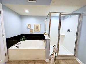 Shower, jetted bath, towels