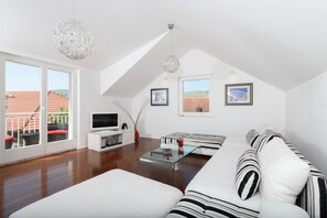 Loftsleilighet | Oppholdsområde | LED-TV