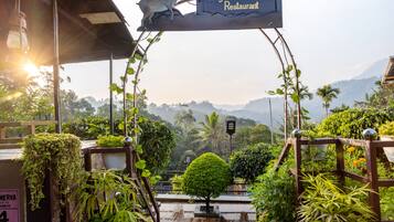 Breakfast, lunch, dinner served; international cuisine, garden views