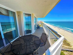 Outdoor dining - Crescent Shores N 901 - Oceanfront Luxury & Unmatched Views! (North Myrtle Beach)