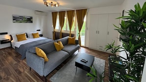 Studio – deluxe, fjellutsikt | Oppholdsområde