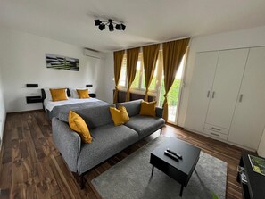 Deluxe Studio, Mountain View | Living area | LCD TV