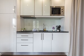 Fridge, microwave, coffee/tea maker, electric kettle